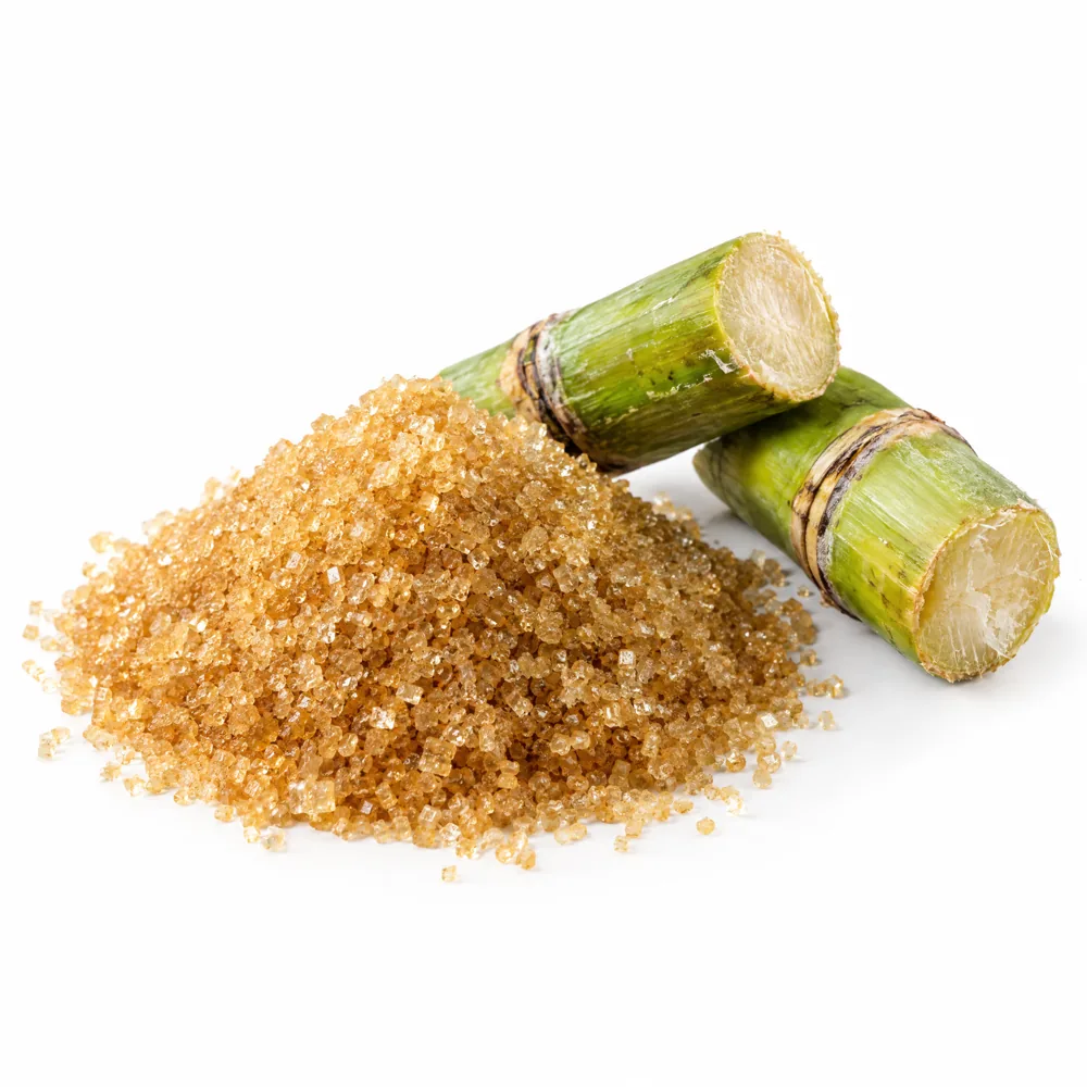 Raw cane sugar crystals.